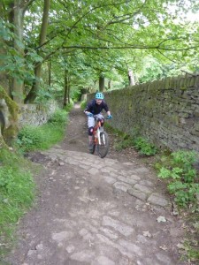 Dan climbing the Pennine Bridleway out of Birch Vale. 
